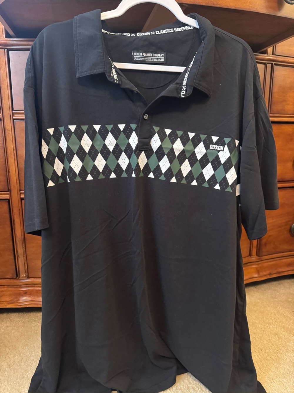DIXXON Black Polo with Green and White Argyle Band